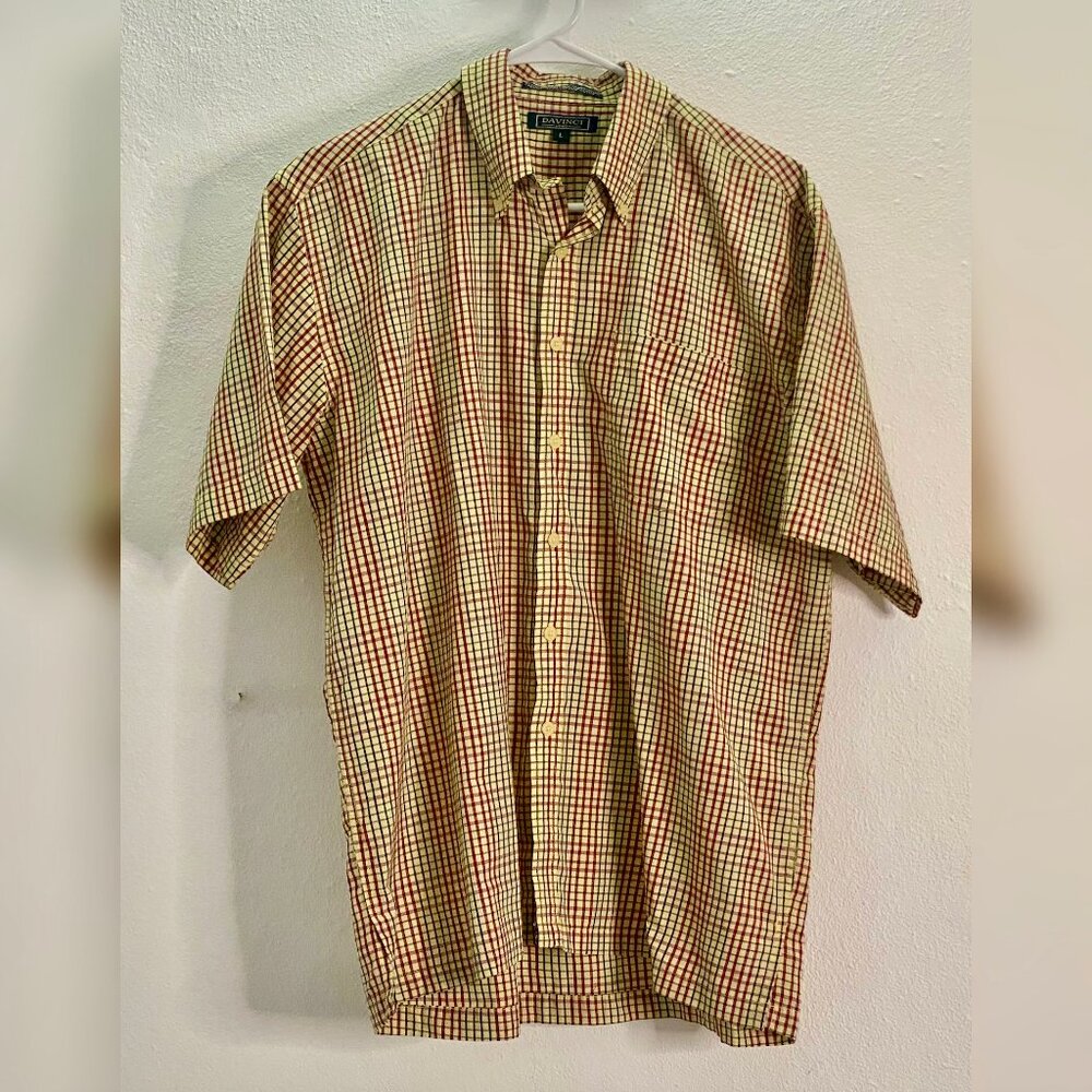 Plaid shirt with mustard yellow and red checkered pattern.